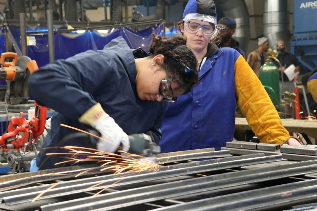 The New-Collar Labor Market Is Blending AI Skills With Human and Technical Work Representative vocational training image for new-collar career coverage. Photo by PTTI EDU on Unsplash.