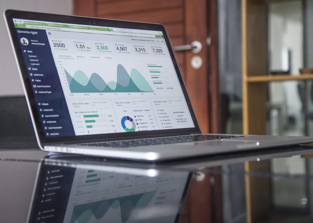 Representative laptop analytics image for comparison of BLS and ADP employment measures. Photo by Carlos Muza on Unsplash.