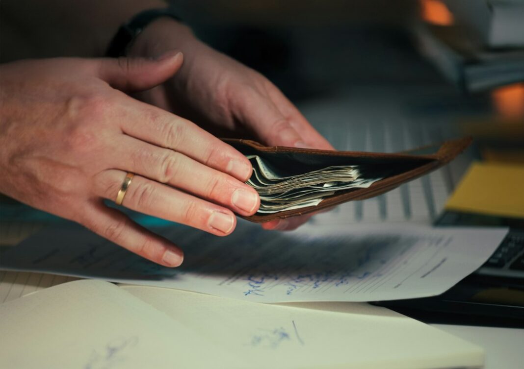 Job Changers Still Held a Pay-Growth Advantage in August, ADP Data Shows Representative money and documents image for job-changer pay coverage. Photo by Jakub Żerdzicki on Unsplash.