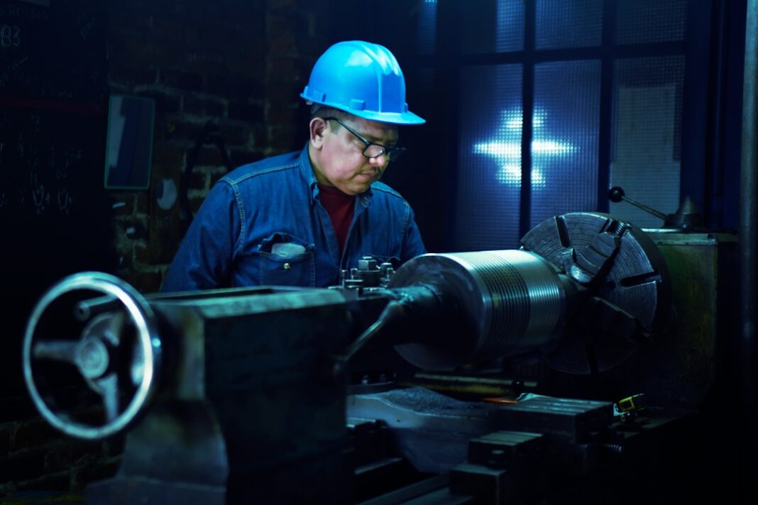 Representative metalworker image for skilled-trades career coverage. Photo by Rafael Juárez on Unsplash.
