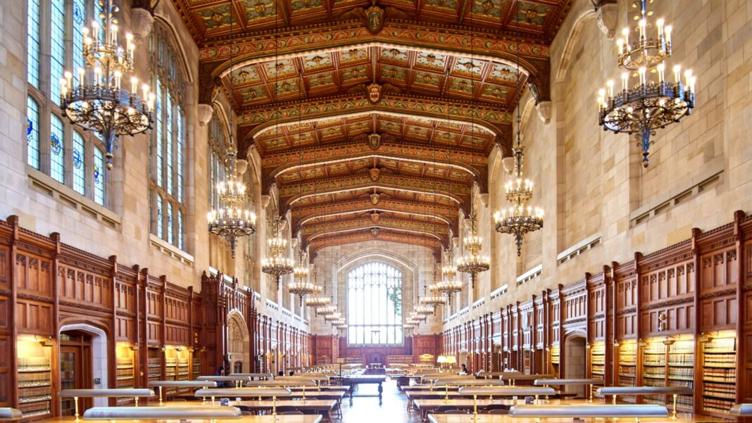 AI Helped Patent Lawyers Draft Better Work; Lasting Skill Gains Favored Experienced Staff A long, vaulted law library reading room with chandeliers, wood paneling and rows of study tables