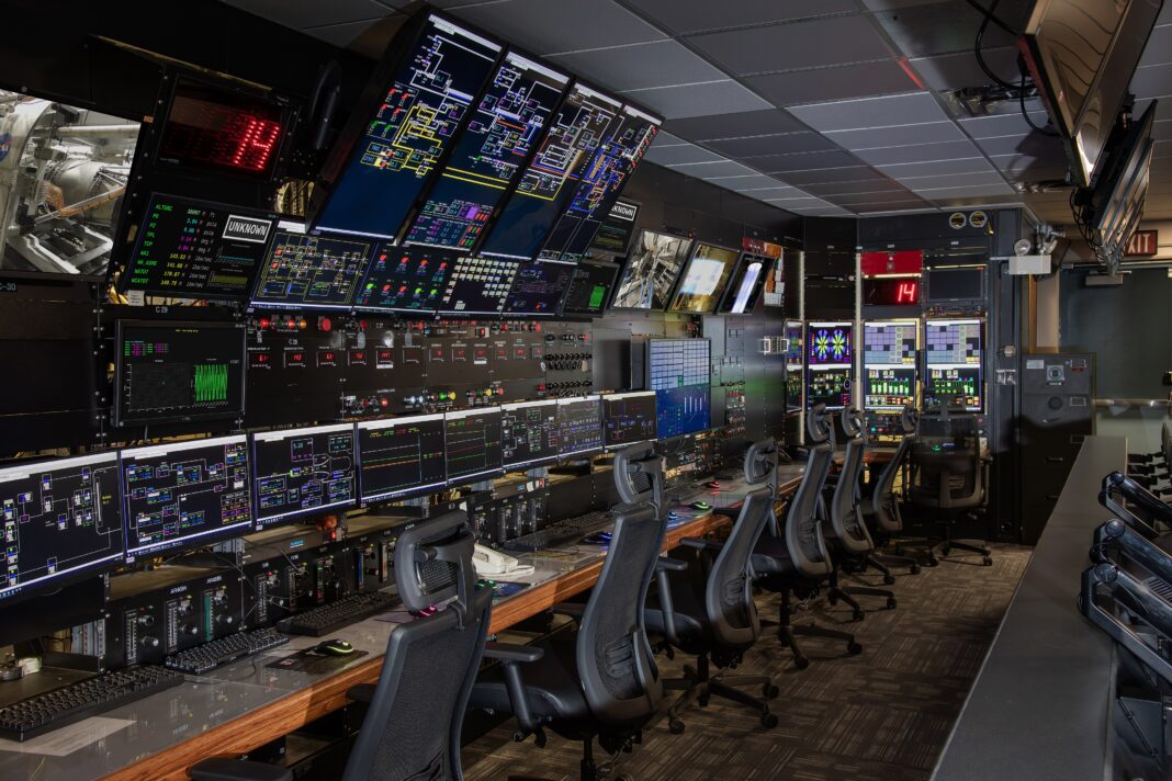A Labor-Market Dashboard for the AI Era: What We Can Measure Now and What Is Missing An engineer monitors data screens in a control room at NASA Glenn Research Center