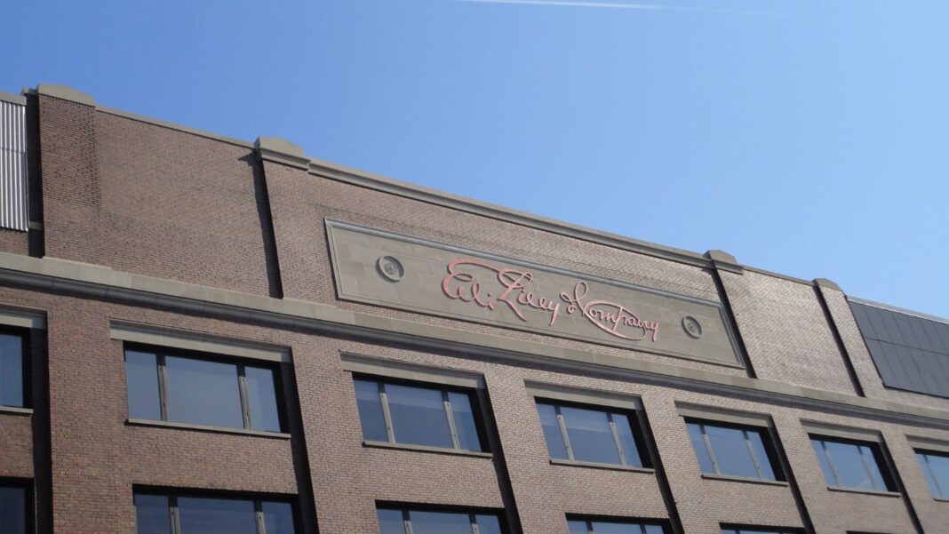 Lilly Begins $6.5 Billion Houston Plant as Construction and Permanent Job Counts Diverge The brick facade of an Eli Lilly and Company building with the company's script signature carved above the windows