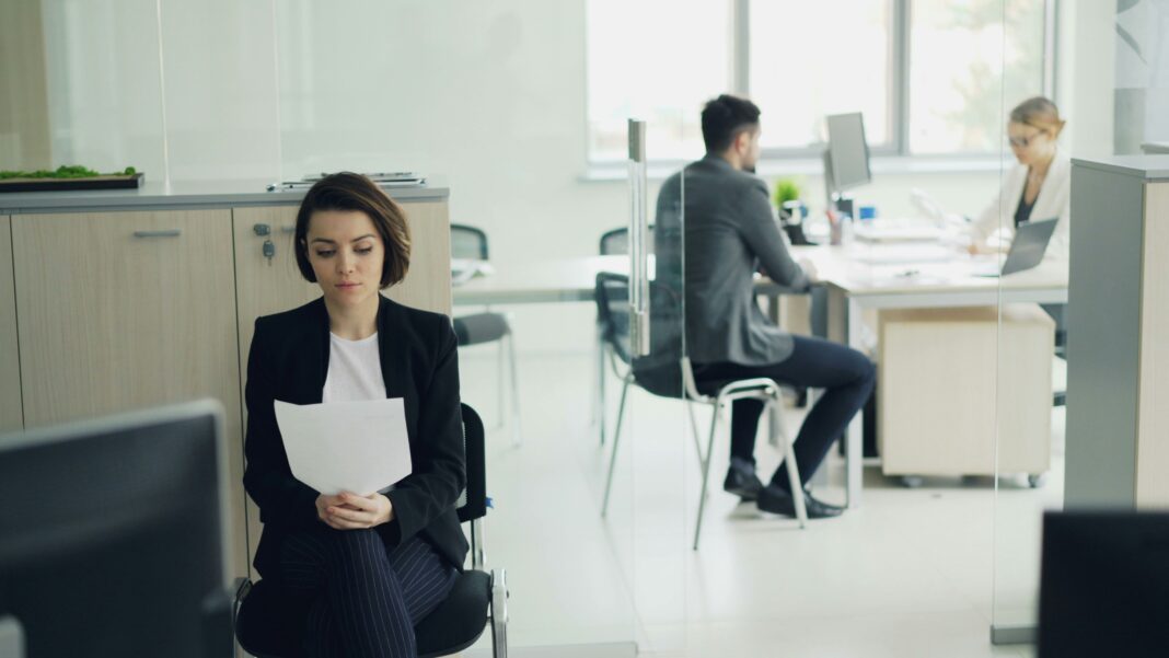 Marginally Attached Worker Count Falls by 236,000 in September People waiting in a modern office before job interviews, used as a representative image for a labor-force story.