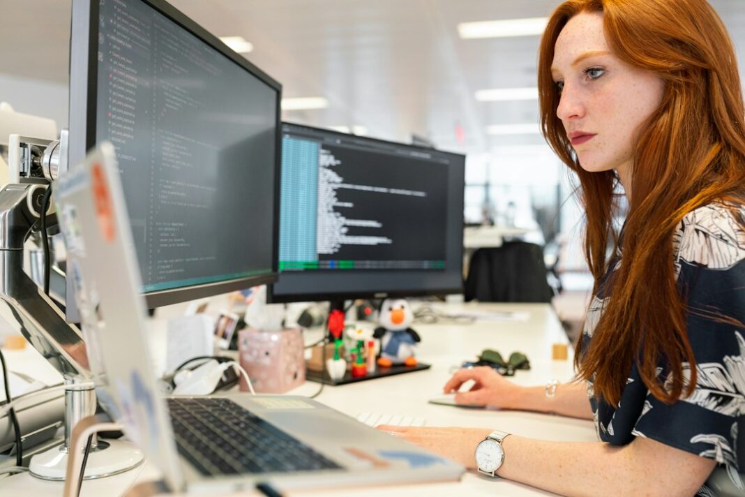Tech Job Postings Reach a Three-Year High, CompTIA Says A software engineer at a computer, used as a representative image for technology hiring.
