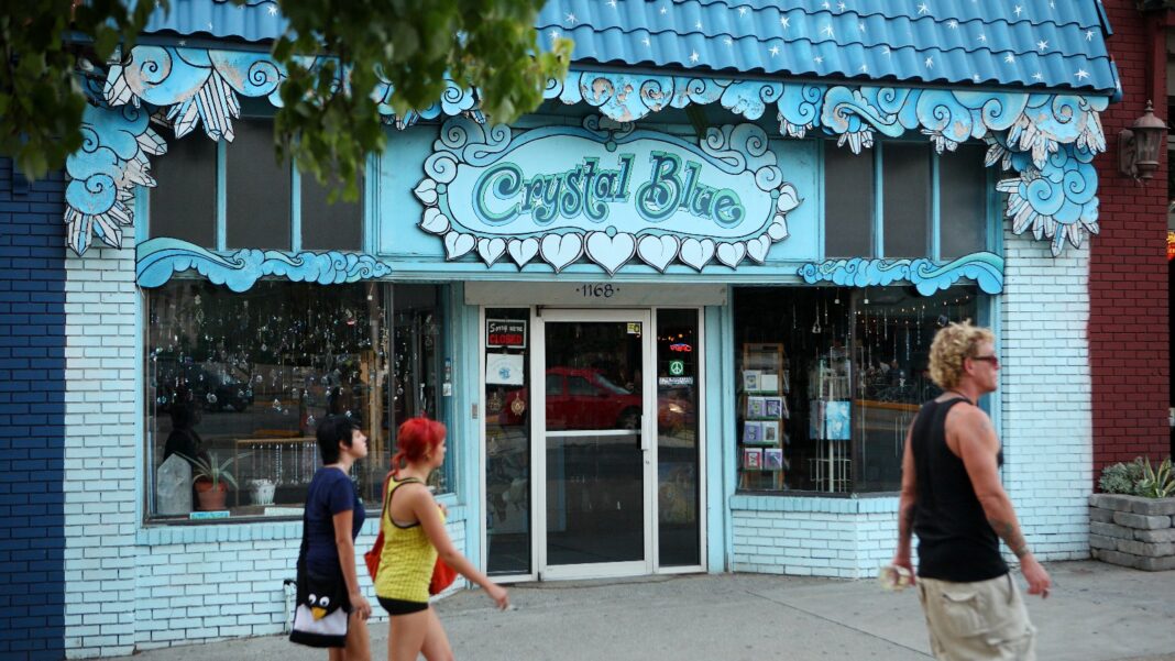 Atlanta Small-Business Open Activity Falls 3.6% in September, Homebase Says Pedestrians walk past a turquoise-painted storefront with ornate trim and a Crystal Blue sign in Atlanta’s Little Five Points